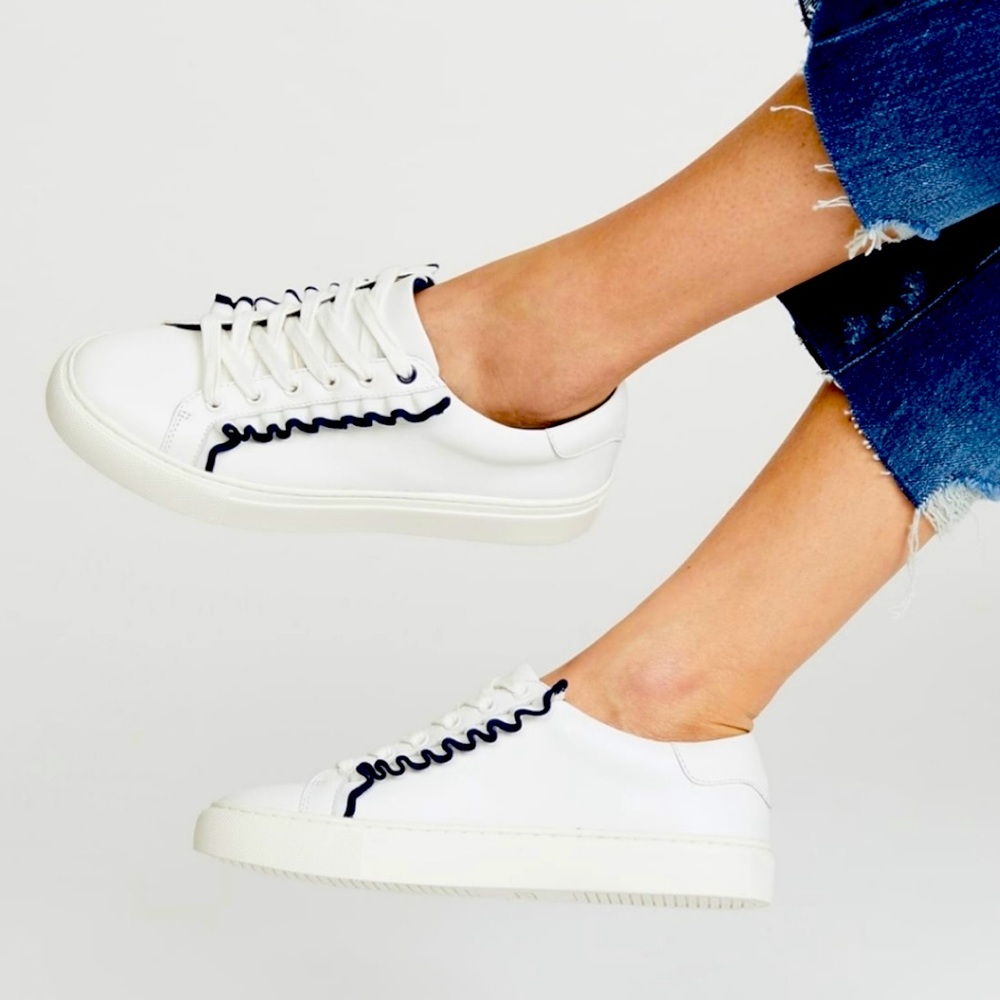 Tory Sport by Tory Burch Ruffle Sneaker- 8.5
Classic white/Navy with navy ruffle
